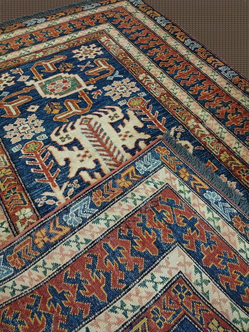 4'2" X 5'8' Handmade Pakistan Orang And Blue Kazak Rug – 4'2" × 5'8"